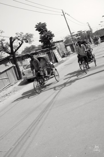 Two boys racing at noon. 